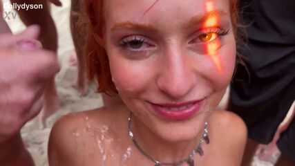 Beach MILF Takes Public Bukkake